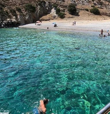 Swimming from the Smile Cruises boat in clear turquoise water